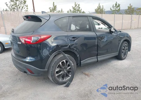 2016 Mazda Cx-5 Grand Touring z USA, uszkodzony, nr VIN JM3KE2DY2G0839090